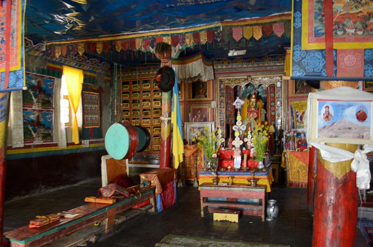18 Inside Tashi Lhakhang Gompa In Phu With Statue Of Padmasambhava, Drum, Masks and Books 